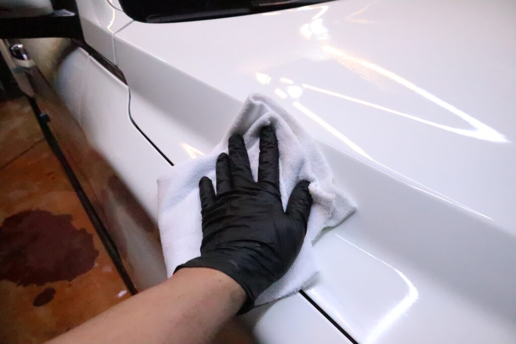 Car buffing: The Science of Pressure, Towel Saturation, and Swirl Marks