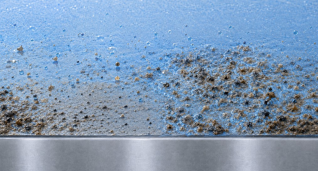 The required alkaline cleaning power changing with the vehicle's contamination level