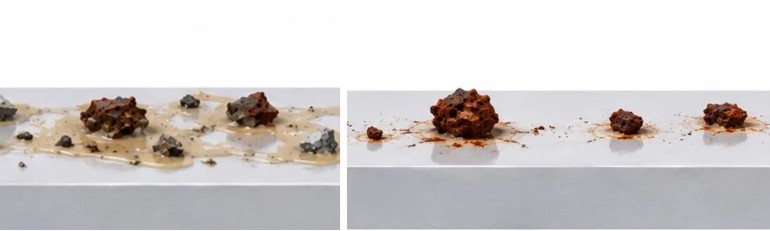 Oxidized iron bonded to clear coat and fine particle contamination held by coating residue after washing.